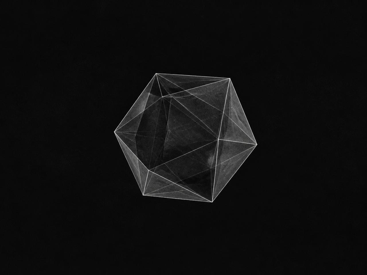 Single translucent faceted polyhedron in dark space